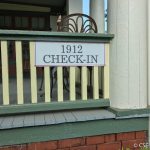 Oasis Check In Metal Sign