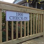Oasis Check In Metal Sign